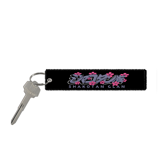 Join The Clan embroidered jet tag front image featuring Shakotan Clan's original logo with sakura flowers