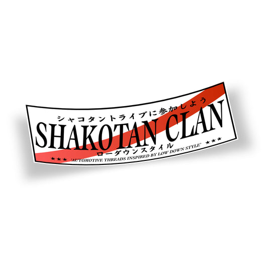 Shakotan Clan slap sticker featuring large Shakotan Clan text and brand slogan Automotive Threads Inspired By Low Down Style on a temporary registration Japanese number plate design. Features Japanese text that translates to Join the Shakotan Clan and Low Down Style