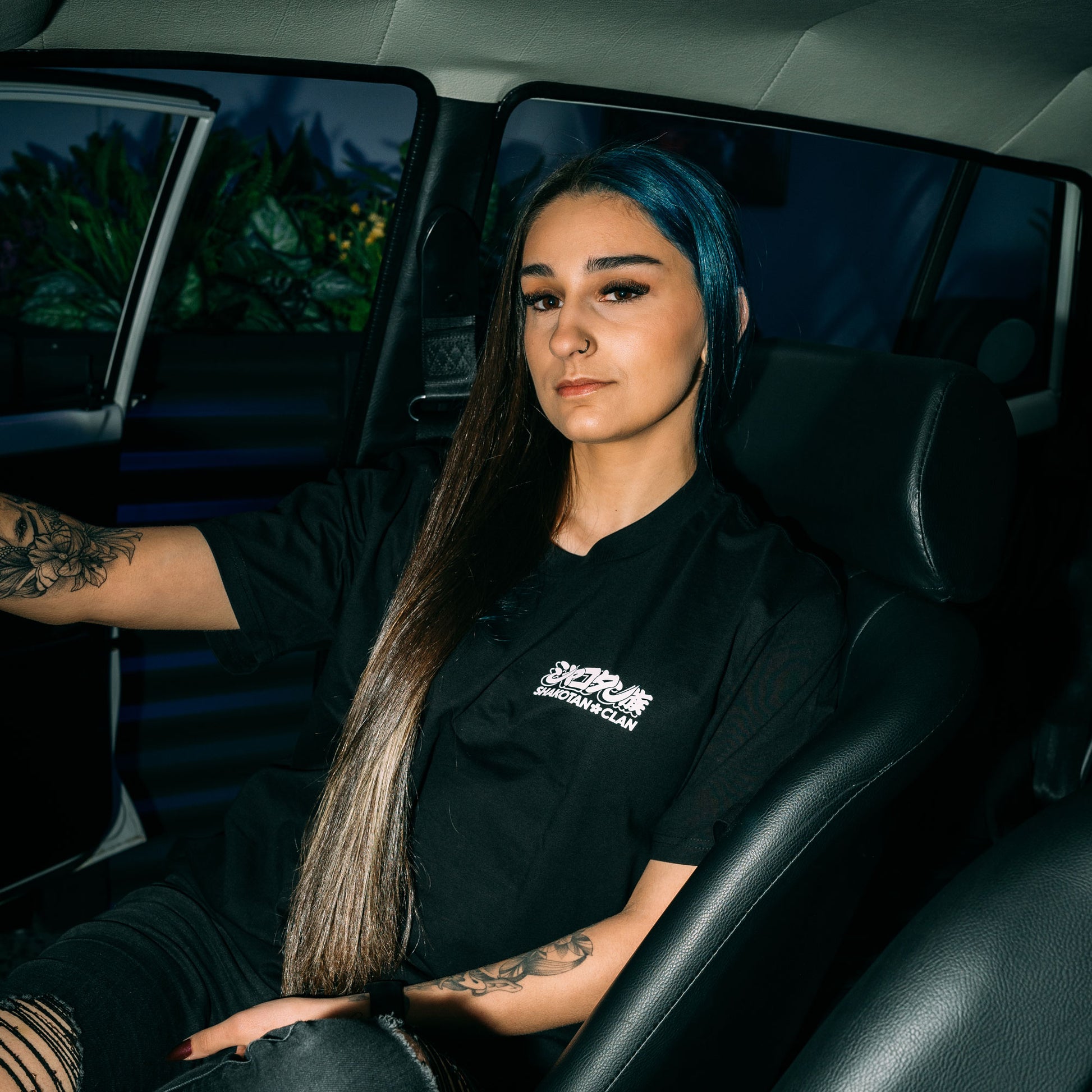 Model Wearing Long Champ Black Classic T-Shirt Showing The Front Print