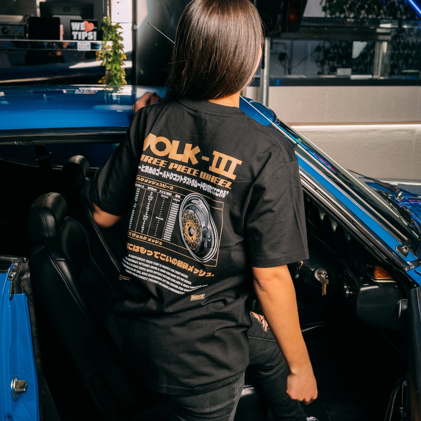 Model Wearing Rays Volk Mesh Black Classic T-Shirt Showing The Back Print