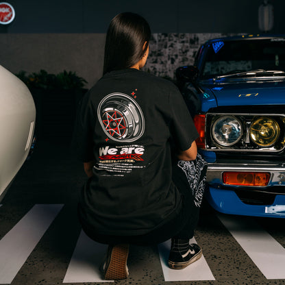 Model Wearing Red_Starshark_Black_Heavy_Faded_T-Shirt_Showing The Back_Print