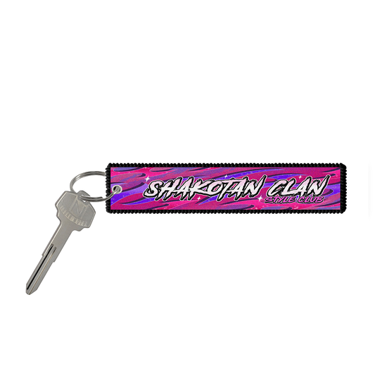 Shakotan Clan Style Club embroidered jet tag front design featuring English text Shakotan Clan Style Club on a pink and purple tribal background